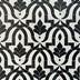 Fleur de Lis Moroccan mosaic tile in black and white zellige pattern