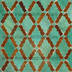 hand cut zellige mosaic tile close up showing traditional Moroccan craftsmanship aqua and honey color combination